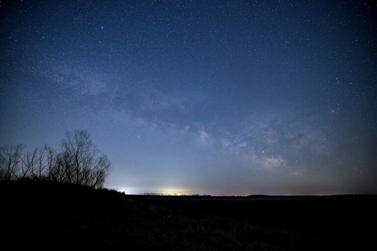 The Milky Way appears just above the horizon.